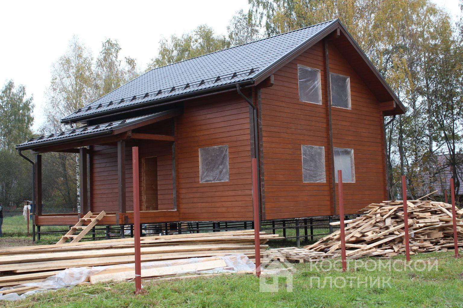Дом из профилированного бруса 10.5х9м с террасой